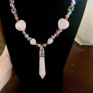 A hand beaded rose quartz necklaces